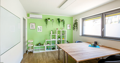Unser Green-Lounge Meetingraum